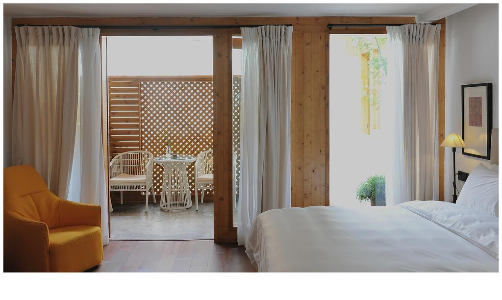Woobay Hotel Лицзян Экстерьер фото